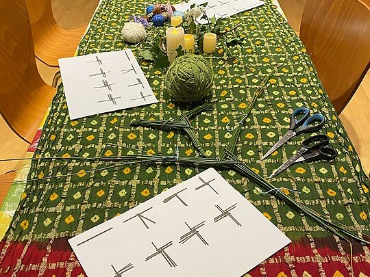 Table laid out for Brigid cross making at Imbolc