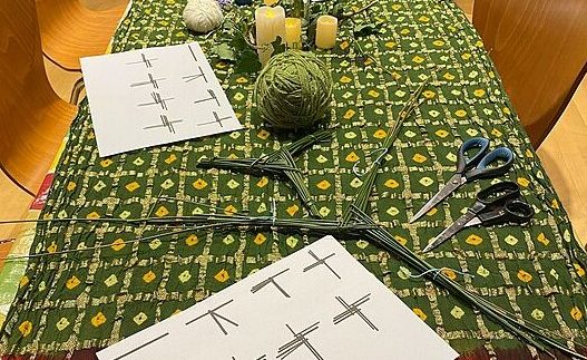 Table laid out for Brigid cross making at Imbolc